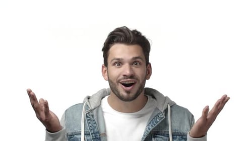 Man Reacts with Surprise and Joy