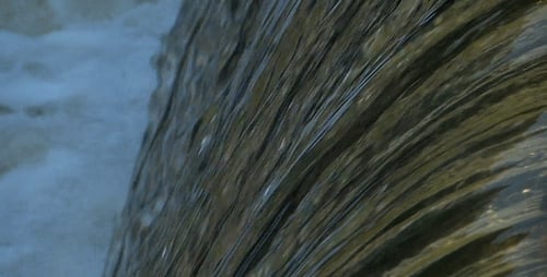 Crystal Water Flowing Down Small Waterfall