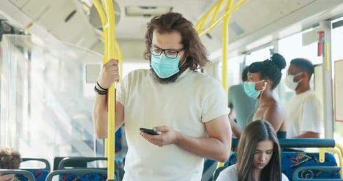 Riding a Bus with Face Masks in the City