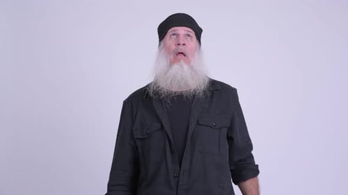 Senior Man Lifting Weights for Exercise