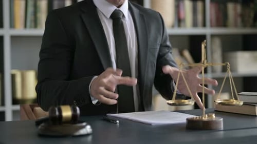Close Up Shoot of Upset Lawyer Hand Checking Document in Court Room