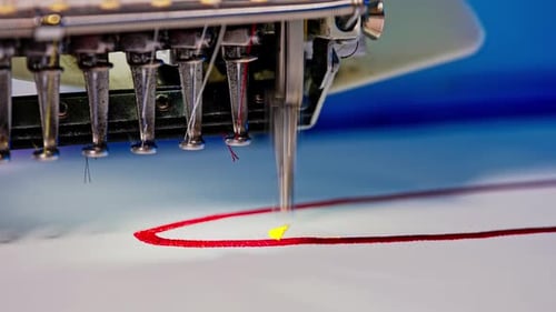 Close Up of Sewing Machine Embroidering Design