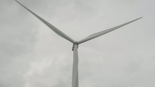 Wind turbines or windmills farm field in industry factory. Power, sustainable green clean energy