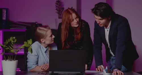 Colleagues Discussing During Online Meeting in Office