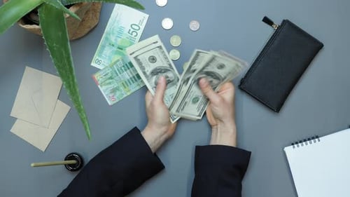 Hands counting money