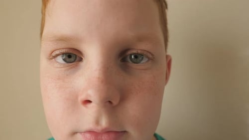 Child Stares Intently Close Up