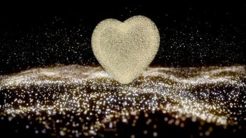 Animated Golden Glitter Heart with Shimmering Particle Waves