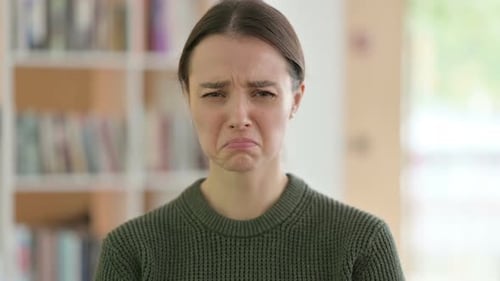 Sad Woman Crying, Looking at Camera