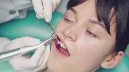 Woman Having Dental Procedure