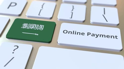 Online Payment Text and Flag of Saudi Arabia on the Keyboard