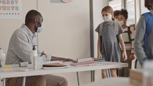 Schoolchildren Greeting Teacher in Non-Contact Way