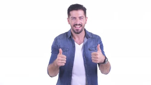 Young Adult Gives Two Thumbs Up Approval