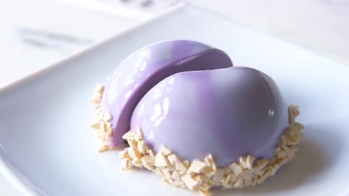 Delicious Glazed Dessert Cake on White Plate