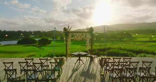 Tropical Wedding Venue with Beautiful Green Landscape at Sunset