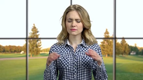 Woman Suffering with Terrible Headache in Home