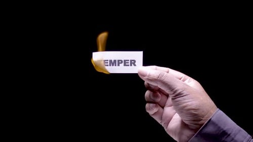 Burning Temper Word on a Card