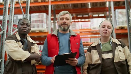 Group Portrait of Multiethnic Colleagues in Warehouse