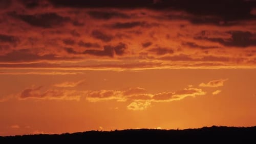 Vivid Sunset Sky with Fiery Orange Clouds