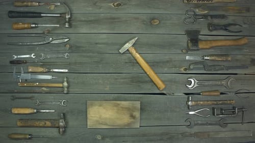 Tools Arranged on a Wooden Surface