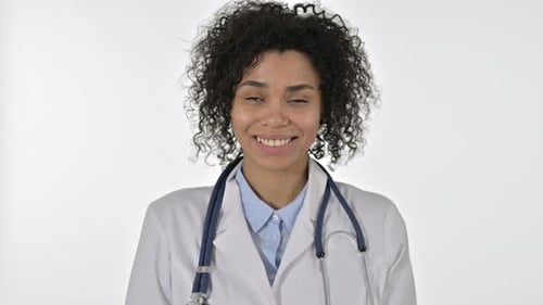 Smiling Woman Doctor Wearing White Coat