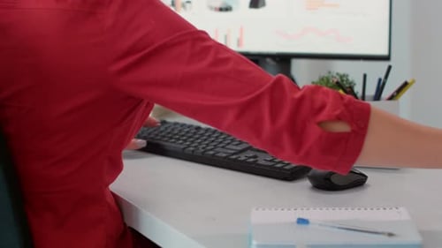 Sales Consultant Answering Landline Phone Call at Company Job