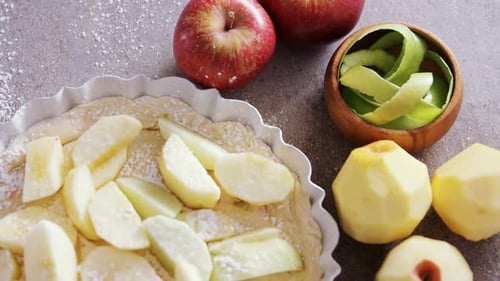 Making Delicious Homemade Apple Pie in Kitchen