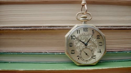 Antique Gold Pocket Watch with Books