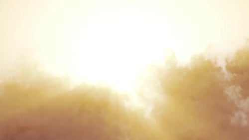 Bright Light Reveal Through Dynamic Clouds