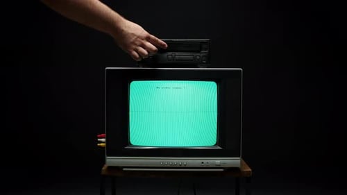 Old Retro Square Television with Blue Screen on Black Background