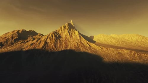 Sommet d'une montagne sur un vaste désert naturel lors d'un magnifique coucher de soleil en été.