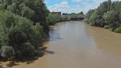 Aerial View Floods Caused By River Overflowing in Cloudy Day
