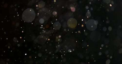 Abstract Lights Against Dark Background