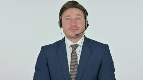 Middle Aged Businessman Talking on Headset, White Background