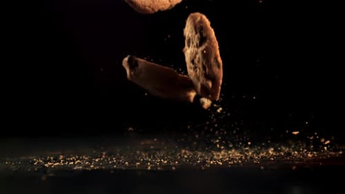 Cookies with Pieces of Chocolate Fall on the Table and Crumble