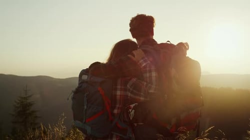 Hikers Standing on Top of Mountain