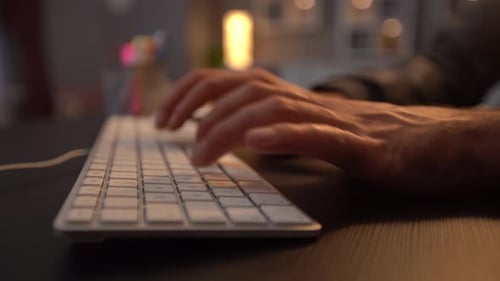 Close-up image of working on keyboard