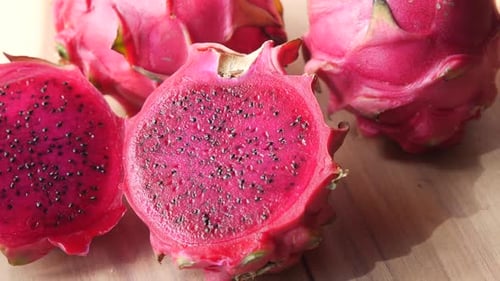 Slice of Dragon Fruit on a Chopping Board