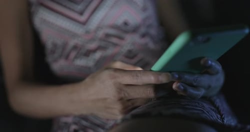 Hands Using Smartphone in Dark Environment