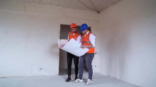 Architects Planning Construction Indoors