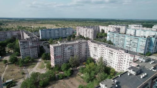 Aerial View MultiStorey Buildings Near Green Forest in Residential Area at City