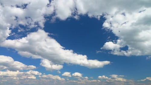 Clouds Drift Across Blue Sky in Time Lapse