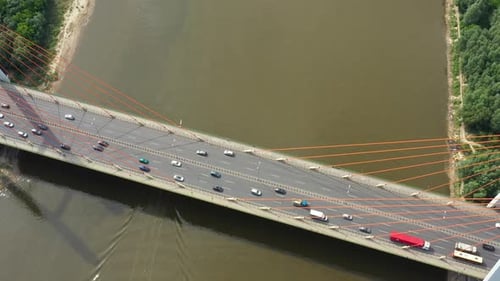 Modern cable stayed bridge and car traffic on background. Highway traffic jam. Aerial View