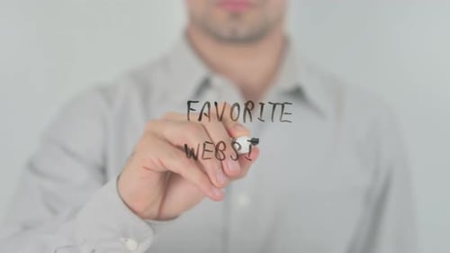 Adult Writes 'Favorite Website' on Clear Surface
