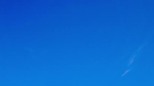Blue Sky with Drifting White Clouds Time Lapse