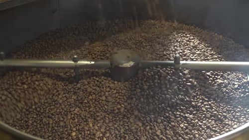 Coffee Beans Being Roasted in Industrial Machine