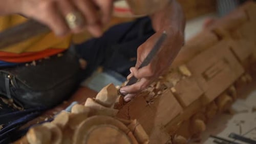 Wood Carver Shaping Project with Chisel and Mallet