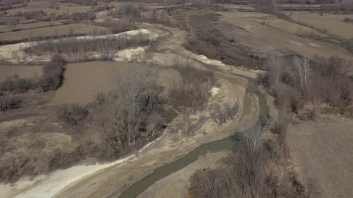 River coast polluted from mine drainage 4K aerial footage