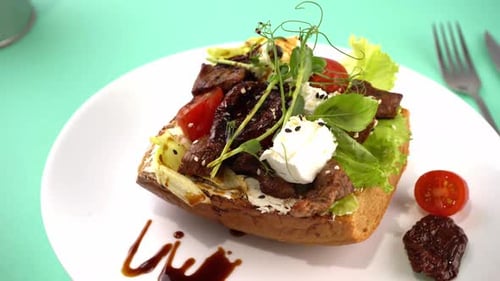 Delicious Meat and Vegetable Open Sandwich Dish
