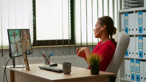 Freelancer Having Video Call in Office