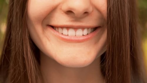 Woman Smiling Close Up Showing Beautiful Teeth